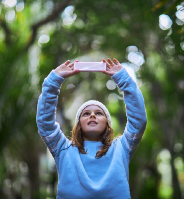 Child on the go with technology.